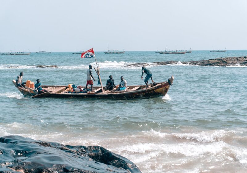 people on brown boat